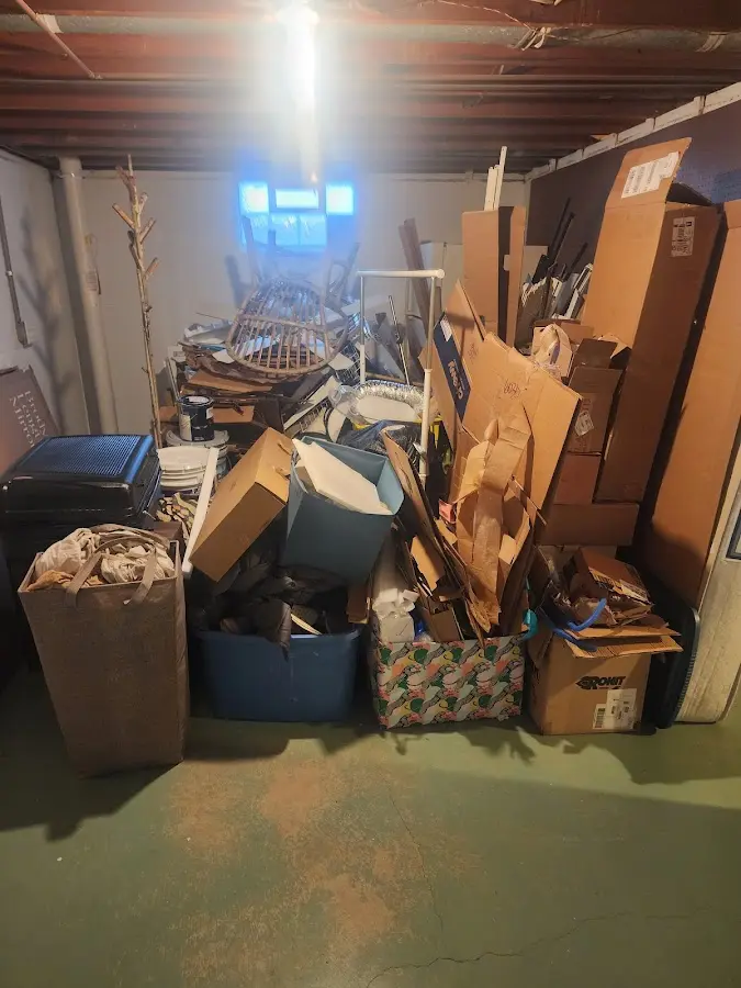 Roll-off dumpster container at job site for Cleanout Dumpster Rental in Blue Ridge